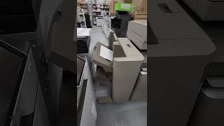 prepering a Canon ImageRunner Advance Office Copier Printer 11x17 for a customer.