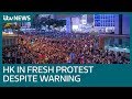 New Hong Kong protests as China moves armed vehicles to border | ITV News