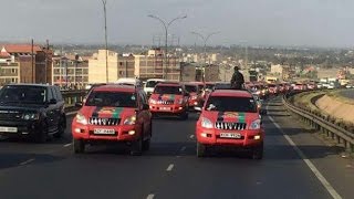 Convoy of Jubilee's 47 Prados snake through Nairobi roads