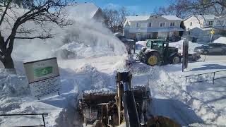 Snow elimination With Cat wheel loader and John Deere tractor