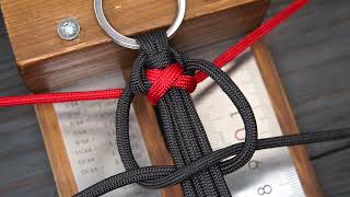 Crisscrossed paracord keychain
