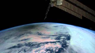 Space Station Orbits Over a Solar Eclipse