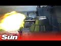 Russian and Chinese warships fire guns in the Japanese sea