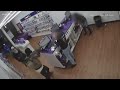 Caught on camera: Armed suspects rob cellphone store