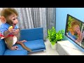 Baby monkey Bon Bon watches TV in his new living room and plays with his friends