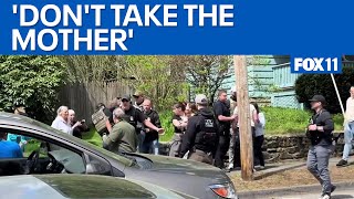 Neighbors chant, pray as they try to stop ICE from detaining mother  | FOX 11 LA