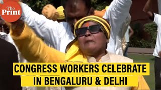 Congress workers celebrate in Bengaluru & Delhi as party leads in Karnataka elections