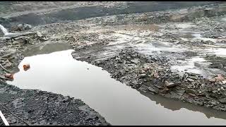 Opencast mine sump area view.