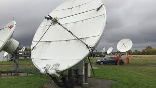 Skybrokers de-installing an Andrew 4.5m X band antenna in Bedford UK