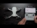 dji mini 2 drone fly more combo කට්ටලයේ unboxing සක්රිය කිරීම සහ පළමු ගුවන් ගමනේ මුලික පාලනයන්