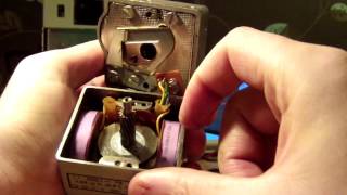 Teardown of German military hand-cranked telephone magneto.