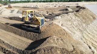 Great Wonderful Komatsu Bulldozer Vs Dump Truck Operator Spreading Sand Filling Huge Lake