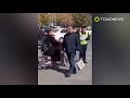 old man slaps cop in the face in china tomonews