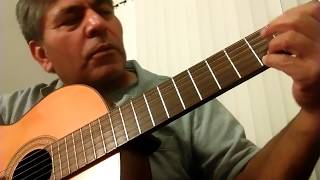 A tocar Guitarra Por Primera Vez