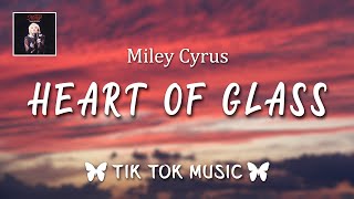Miley Cyrus - Heart of Glass (Lyrics) "It soon turned out I had a heart of glass" (ericasmoot)