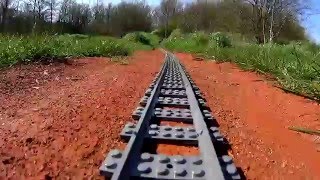 Long Lego train layout outdoor ride