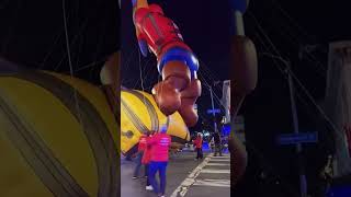 Scientology balloon falls down at Hollywood Christmas parade in Los Angeles as protesters shout