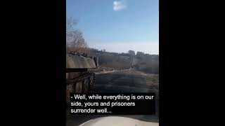 Ukrainian motorists talks to Russian troops who are out of fuel