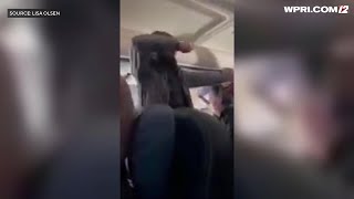 Man tries to stab flight attendant, open door of plane