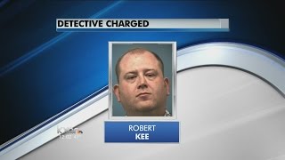 Detective arrested