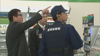 年末控えコンビニで防犯指導・愛媛新聞