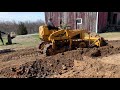 old international td 9 bulldozer pushing some dirt