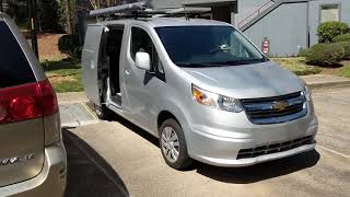 Chevrolet City Express stealth camper w/ 300W of solar.