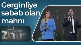 Gərginliyə səbəb olan \