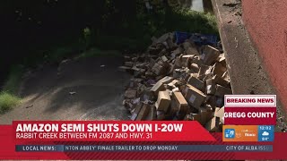 OFFICIALS: Amazon 18-wheeler goes off bridge, trailer breaks after driver falls asleep on I-20 near