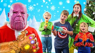 Nerf Battle: Thanos vs Elf an Avengers Hero Kidz Christmas