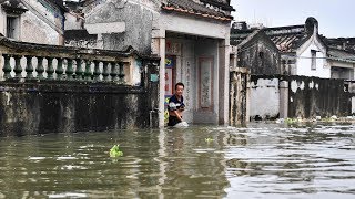 Two killed, two missing, 85,000 relocated as downpour lashes Guangdong