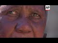 Funeral of woman shot as she ran away during clashes in Harare