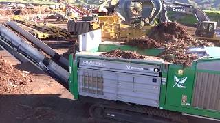 Komptech Crambo 6000 Dual-Shaft Shredder Processing Green Waste