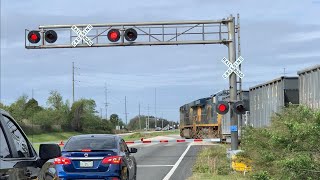 RR Crossing At 4 Lane 65MPH Highway!  RR Diamond In Middle Of Hiway & Amtrak Roars Thru Crossing!