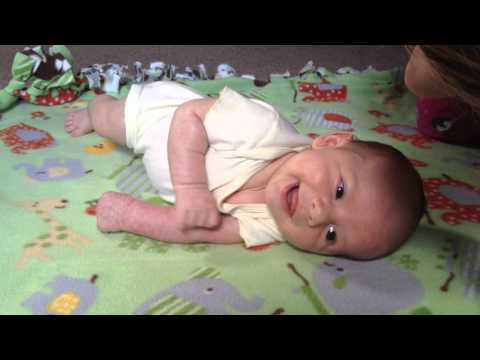 Teaching baby to roll over Teaching baby to roll over