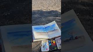 Une aquarelle sur la plage de Perivolos à Santorin