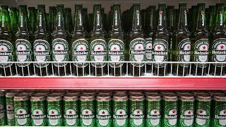 Heineken Cuts Forecast as Pricing Hits Consumption