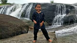 Is my lovely son, kinchumanda water falls.