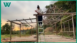 Young girl building bamboo house in the forest | Workers HD