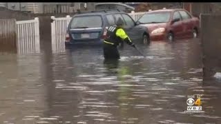 Water main break floods Jamaica Plain neighborhood, damages street