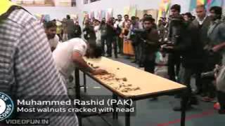 Most Walnuts Cracked With Head In One Minute - Must Watch.mp4