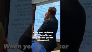 Professor holds student's fussy baby during lecture