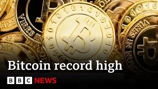 Bitcoin races to record high as big US investors pile in | BBC News
