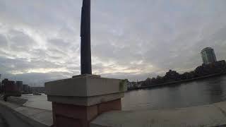 Strolling alongside Thames River in the Borough of Lambeth