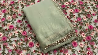 Shimmer silk with rich ghunguroo border and net blouse.