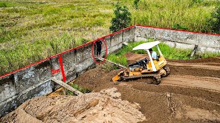 Wonderful Bulldozer Sand Filling sand With A 10 Wheel Dump Truck While Pushing Sand into the fence