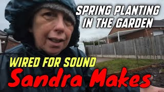 Sandra gets ready for spring planting in the garden