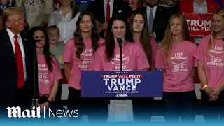 Roanoke College women's swim team members take stand at Donald Trump's Virginia rally