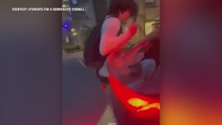 Cornell president accused of hitting students with his car