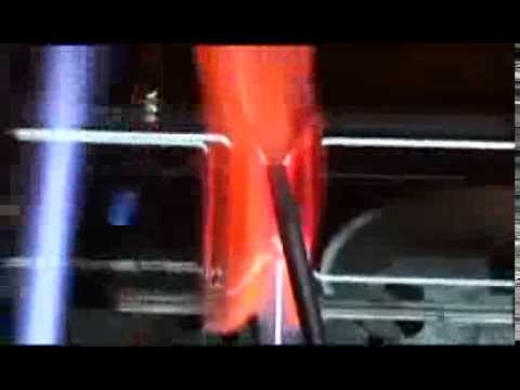 Glass blowing a double-wall vacuum mug Glass blowing a double-wall vacuum mug
